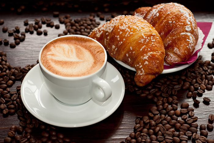 A Cup of Cappuccino with Croissant